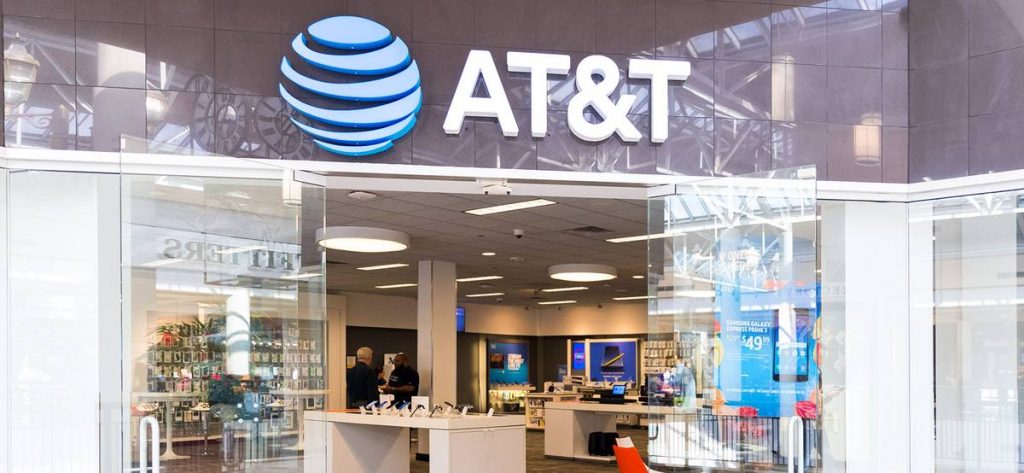 AT&T will cut dividends in half