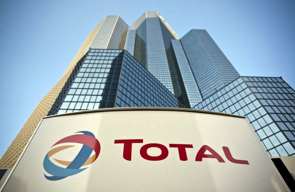 Компания  Total